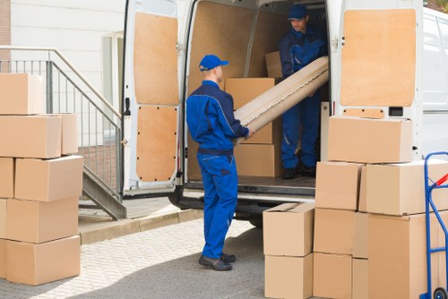 Flat removals team planning a move in Chiswick residential street