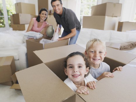 Moving team loading boxes during a residential relocation