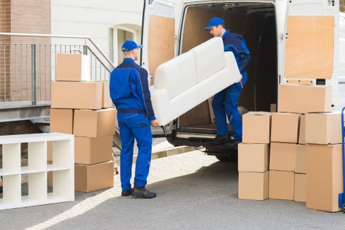 Local removals team planning a move in Chiswick residential street