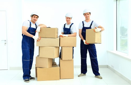 Packed boxes and furniture prepared for a local move in Chiswick