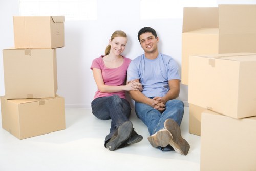 Local office removals team handling furniture in Chiswick