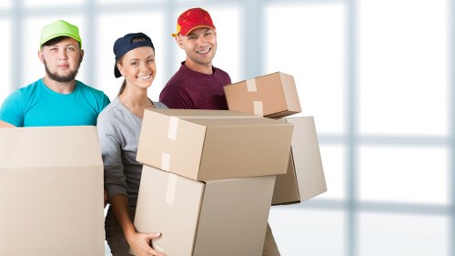 Wardrobe boxes and packing supplies arranged for a Chiswick move