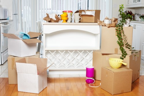 Removal specialists moving office furniture in a Chiswick commercial property
