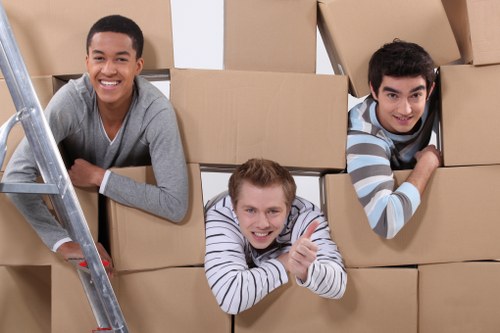 Careful loading of household furniture for transport in West London