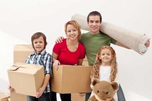 Professional movers loading furniture for a Chiswick relocation