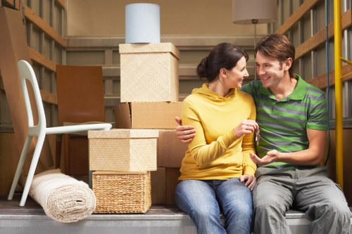 Packed household boxes ready for house removals in Chiswick